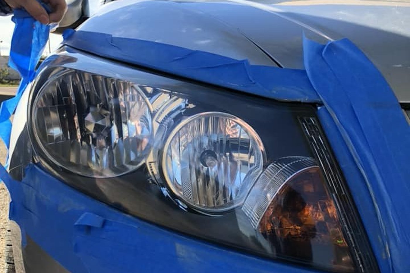 Crystal clear headlight after restoration at AJ's Auto Rehab